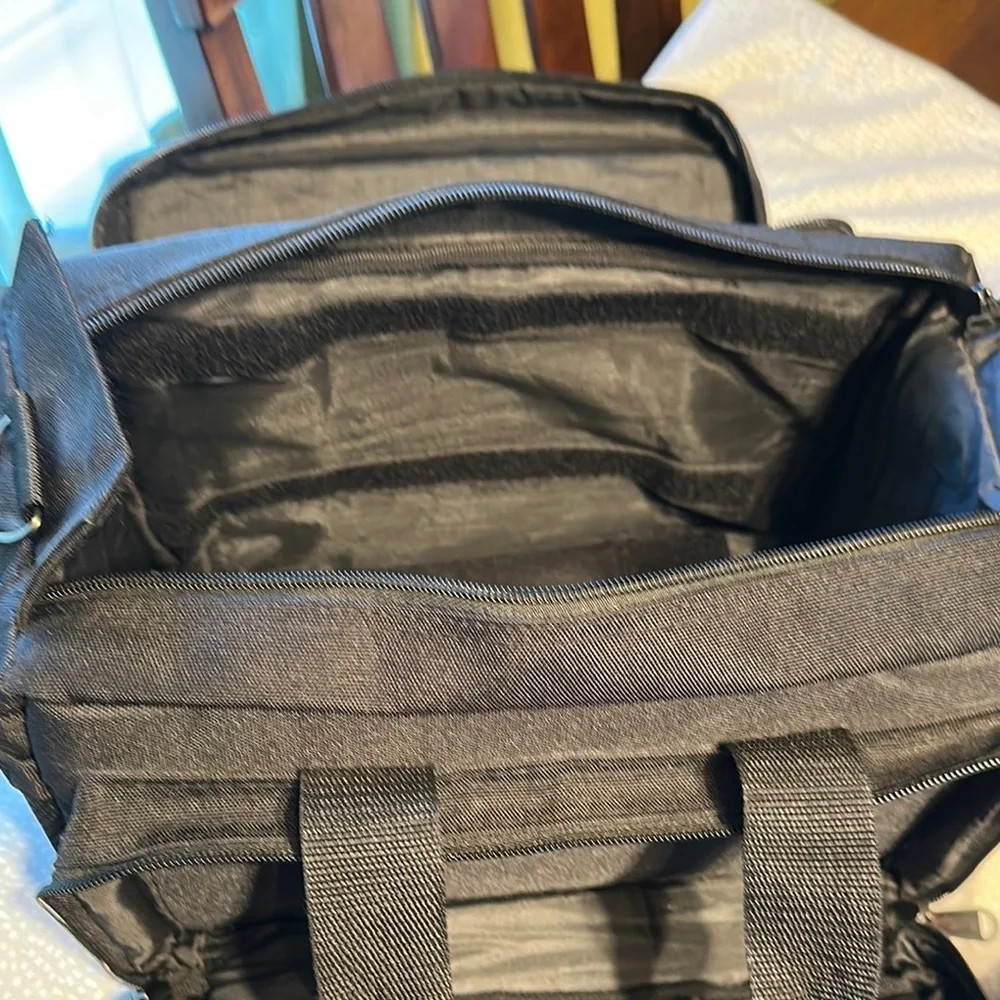 Black Duffel Bag with Rigid Structure and Durable Fabric